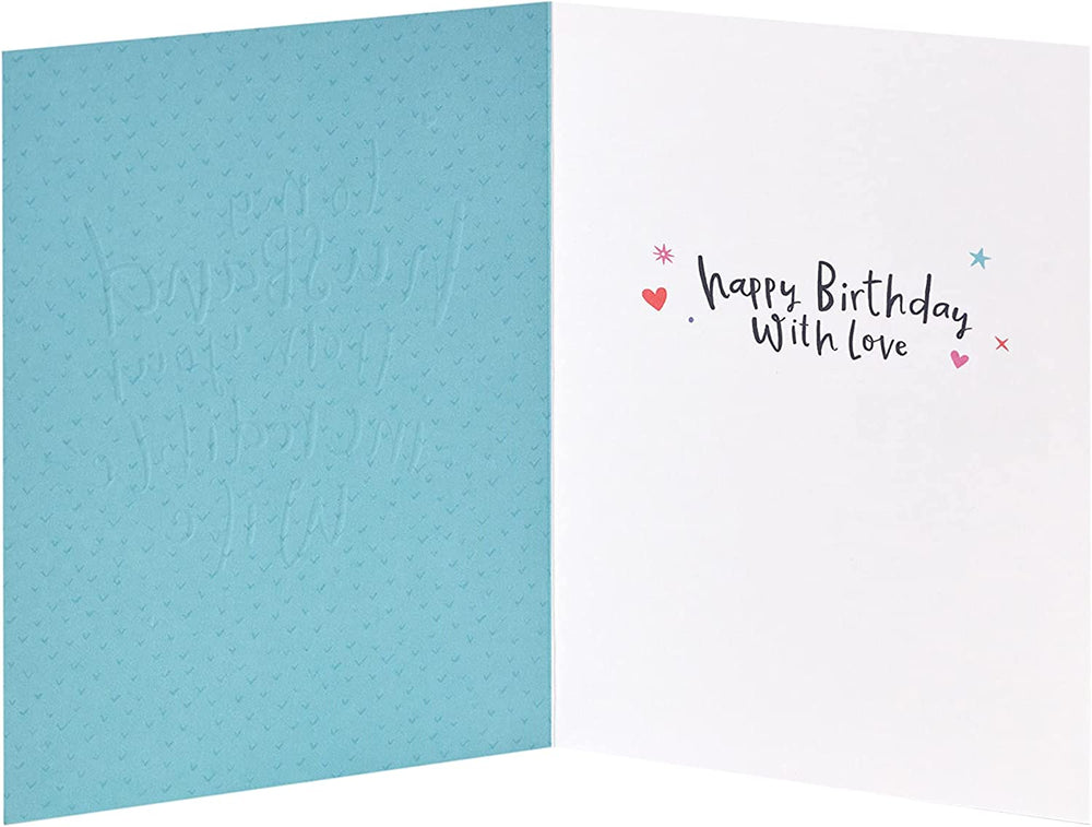 UK Greetings silver foil lettering husband birthday greeting card with elegant design and festive message on front.