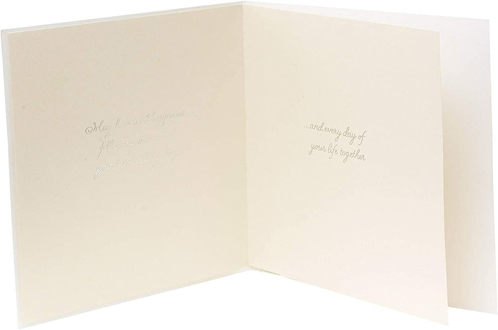 Elegant UK Greetings wedding greeting card featuring simple design with luxurious, intricate details on a white background.