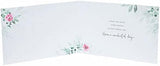 UK Greetings Simply Traditional Sister birthday card with floral design, featuring colorful flowers on the front.