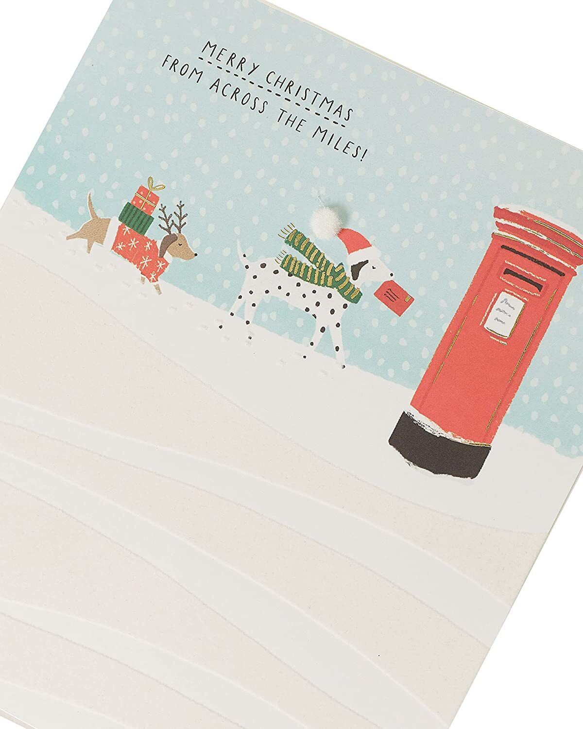 UK Greetings Snow Dogs Christmas Card featuring a festive design with snow dogs, suitable for holiday greetings and seasonal cheer.
