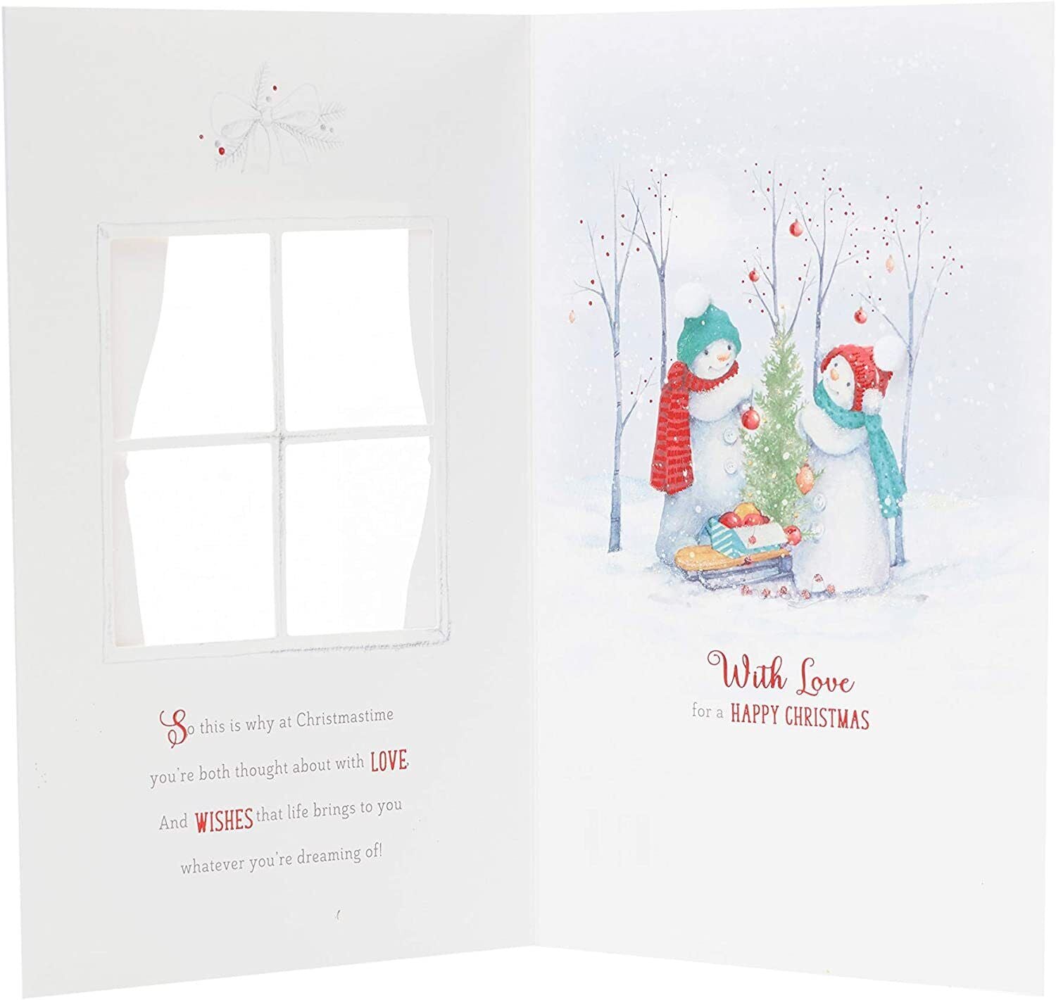 UK Greetings Christmas card featuring snowmen decorating a tree, with daughter and son-in-law in a festive holiday scene.