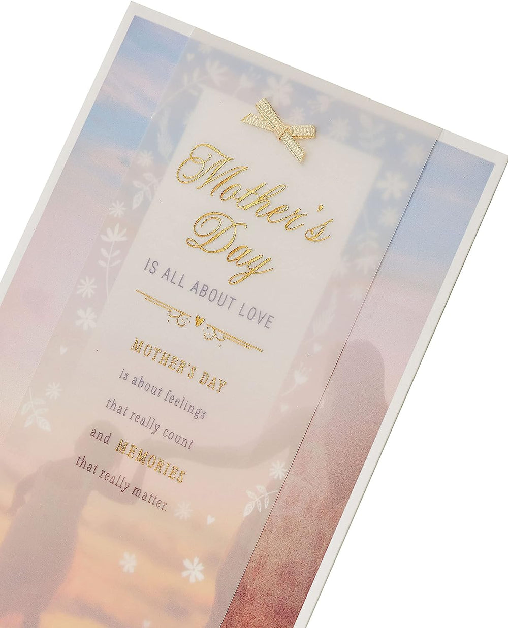 UK Greetings Mother's Day card featuring a soft sentimental design with heartfelt floral illustrations and elegant script.