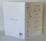UK Greetings son birthday greeting card with sentimental verse, featuring colorful birthday-themed illustrations.