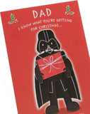 UK Greetings Star Wars Christmas card for Dad featuring Darth Vader design, festive holiday greeting card with Star Wars theme.