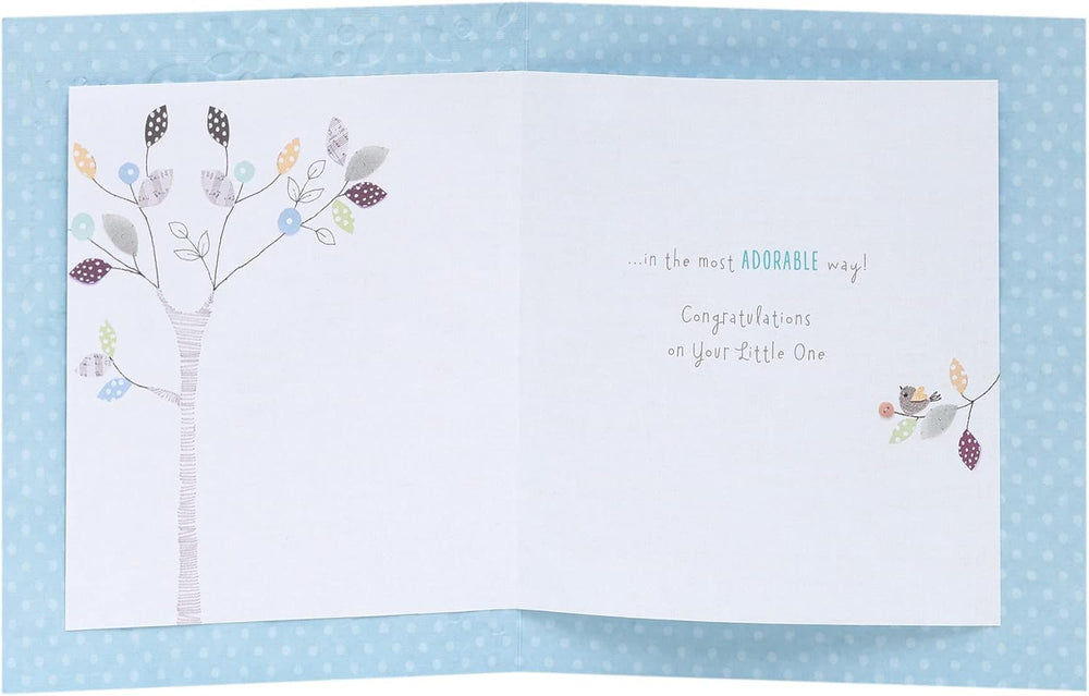 UK Greetings Sweet Giraffe New Baby Card featuring a cute giraffe illustration on a cheerful greeting card for new arrivals.