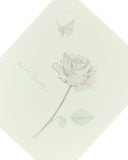 UK Greetings sympathy card featuring a delicate floral design, ideal for expressing condolences with a thoughtful touch.