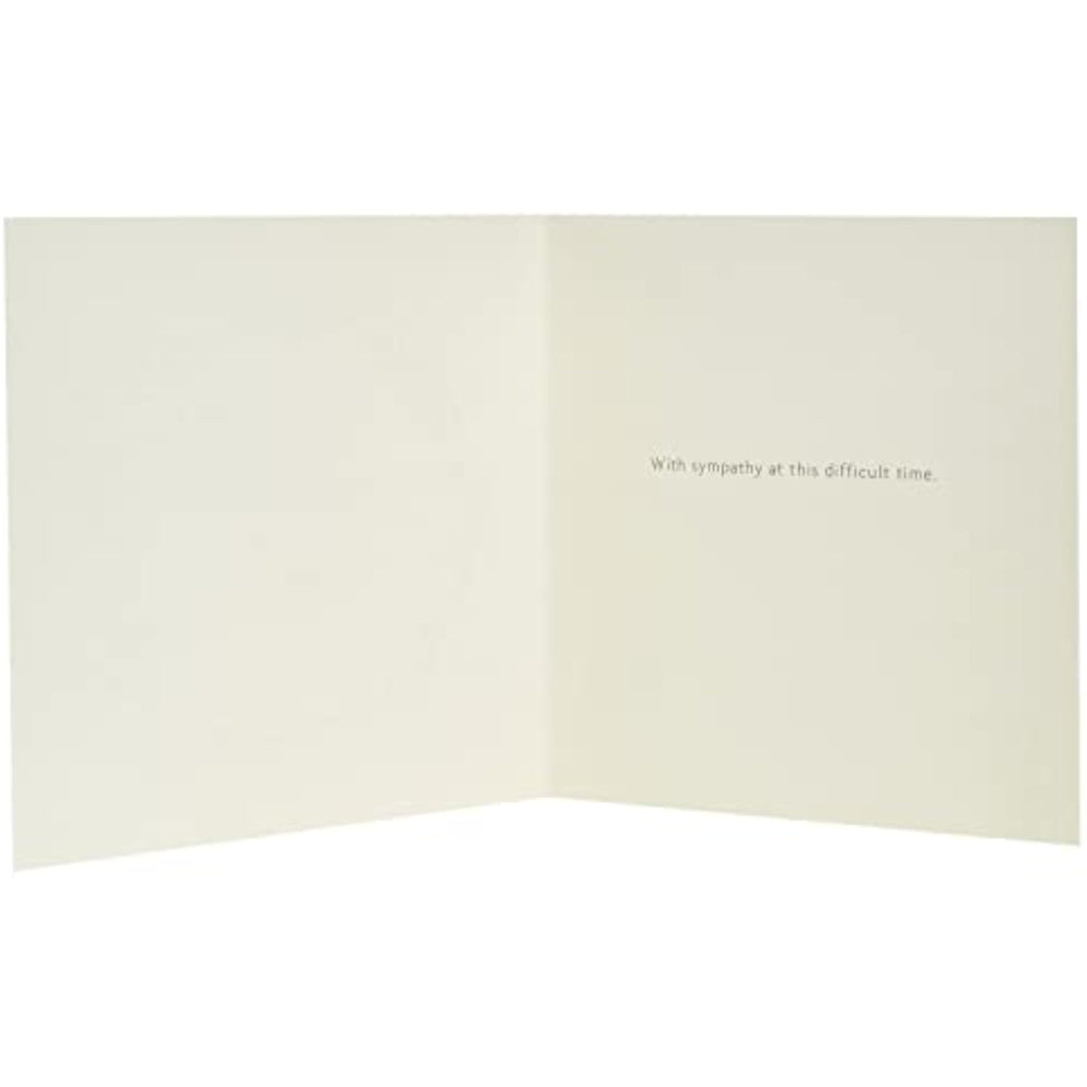 UK Greetings sympathy card featuring a floral butterfly design and sentimental verse, perfect for expressing condolences.
