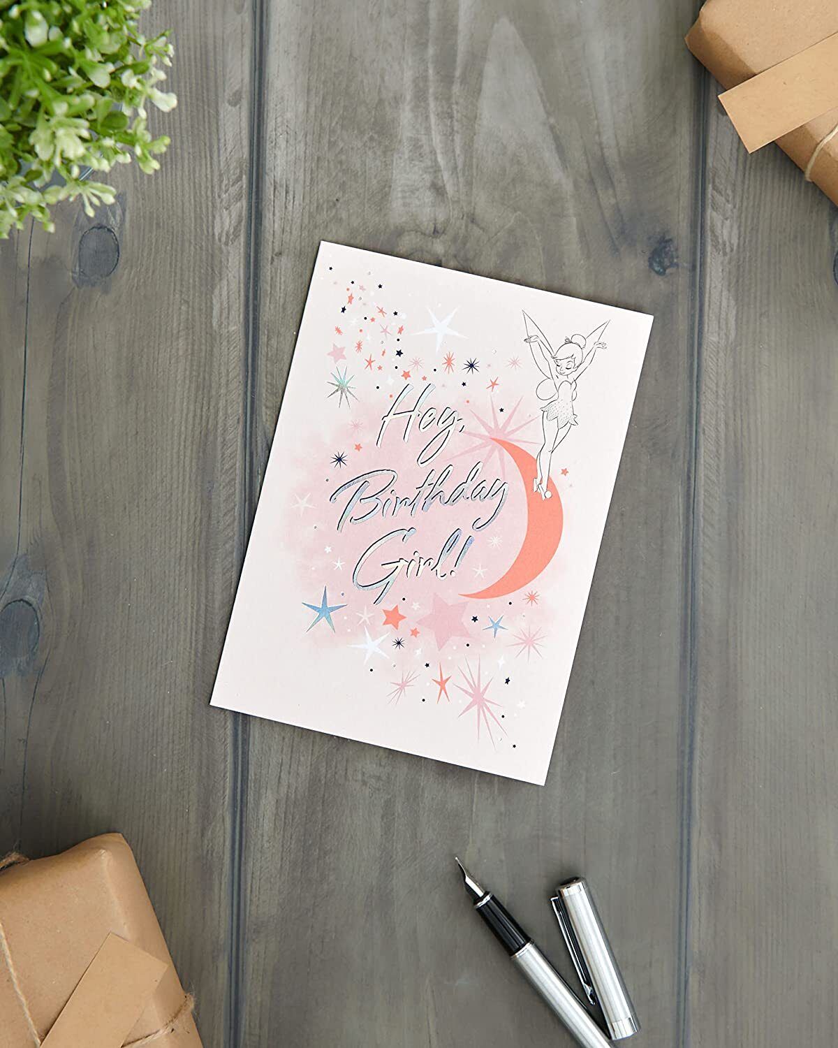 UK Greetings Tinker Bell birthday card featuring a colorful illustration of Tinker Bell from Peter Pan for special celebrations.