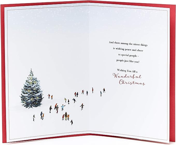 UK Greetings Christmas card featuring festive holiday design, ideal for sending seasonal greetings to loved ones.