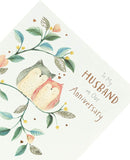 UK Greetings anniversary greeting card for husband, featuring heartfelt message and decorative design for special celebration.