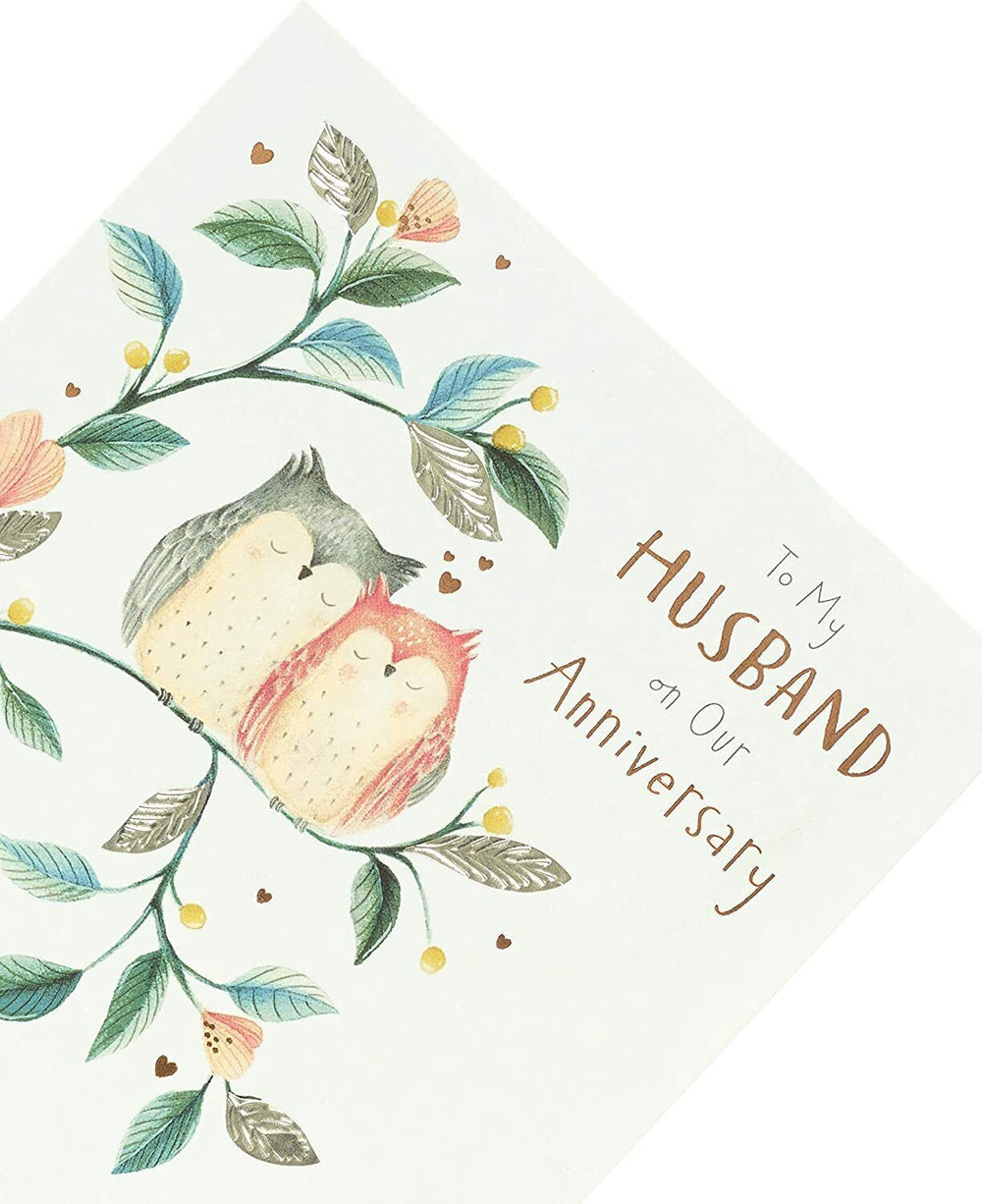 UK Greetings anniversary greeting card for husband, featuring heartfelt message and decorative design, perfect for celebrating your special day.