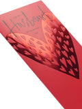 UK Greetings Valentine's Day card for husband featuring a bold red design, perfect for expressing love and affection.
