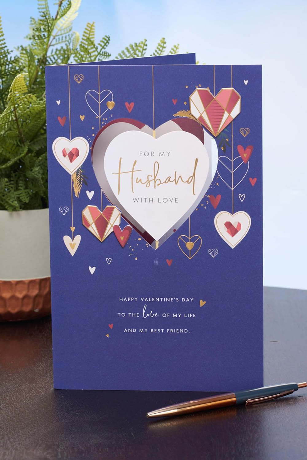 UK Greetings Valentine's Day card for husband featuring a dark blue design, perfect for expressing love on this special day.