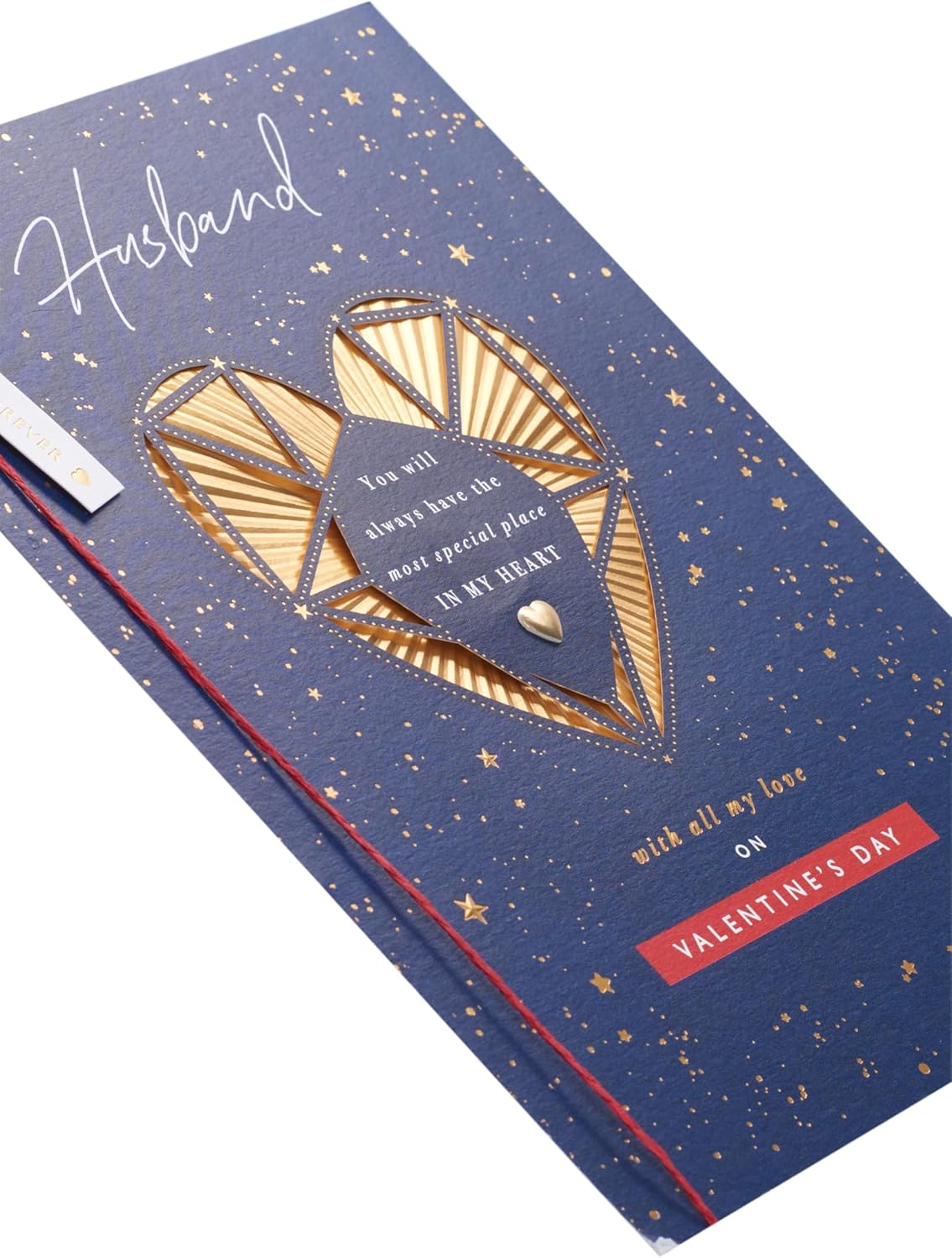 UK Greetings Valentine's Day card for husband featuring an intricate gold heart design on the front.