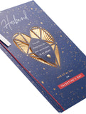 UK Greetings Valentine's Day card for husband featuring an intricate gold heart design on the front.