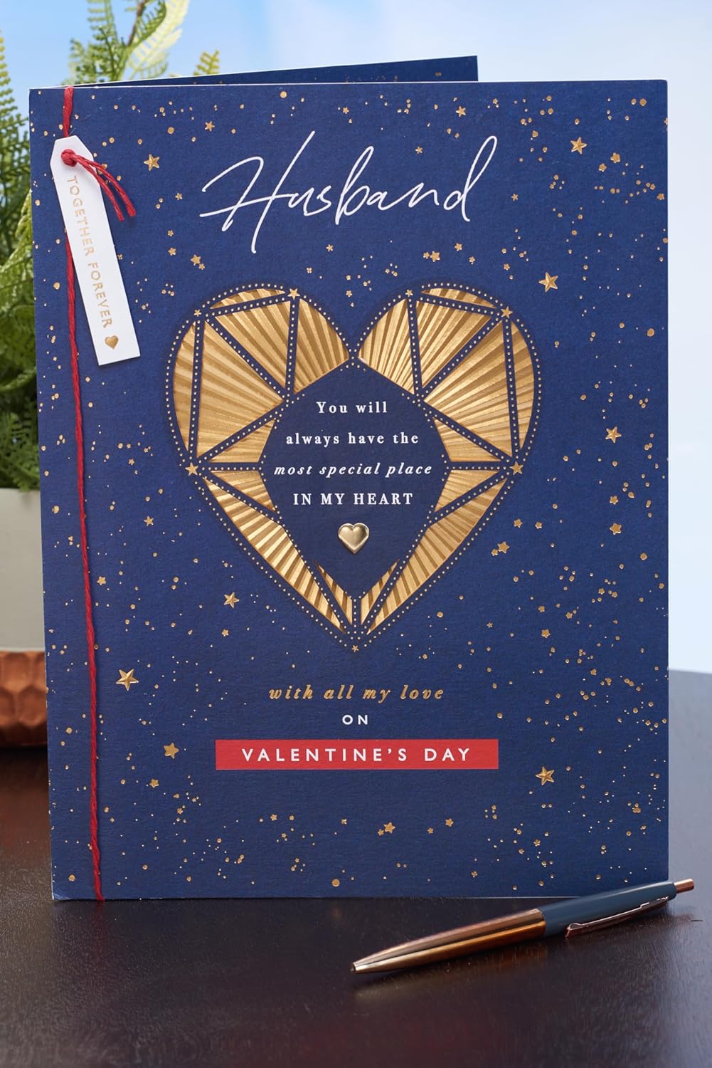 UK Greetings Valentine's Day card for husband featuring an intricate gold heart design, perfect for expressing love.