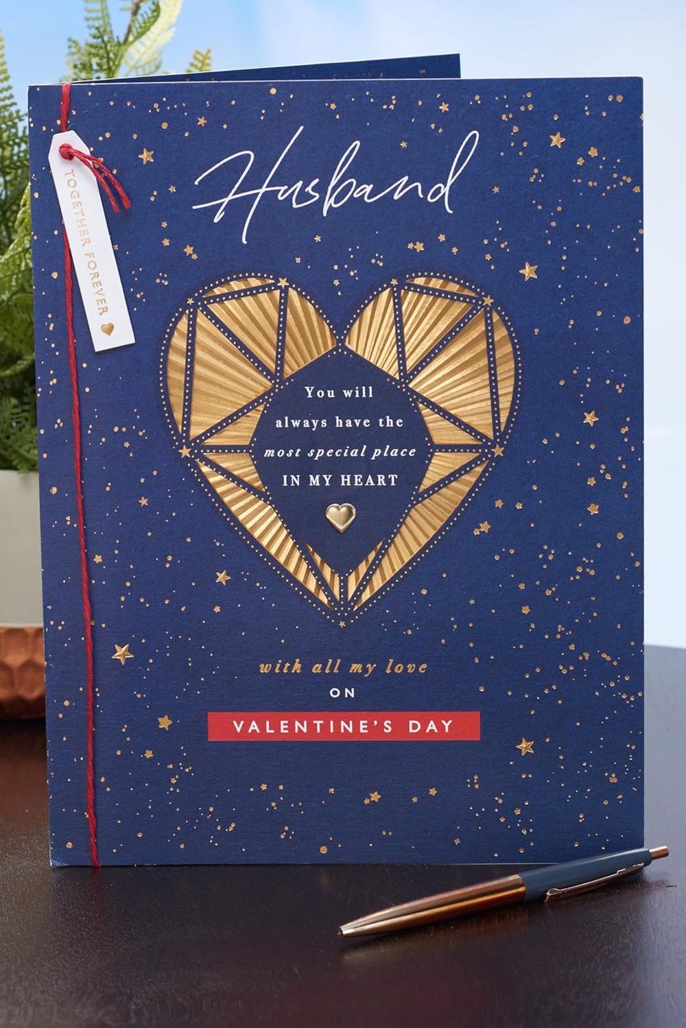 UK Greetings Valentine's Day card for husband featuring an intricate gold heart design, perfect for expressing love.