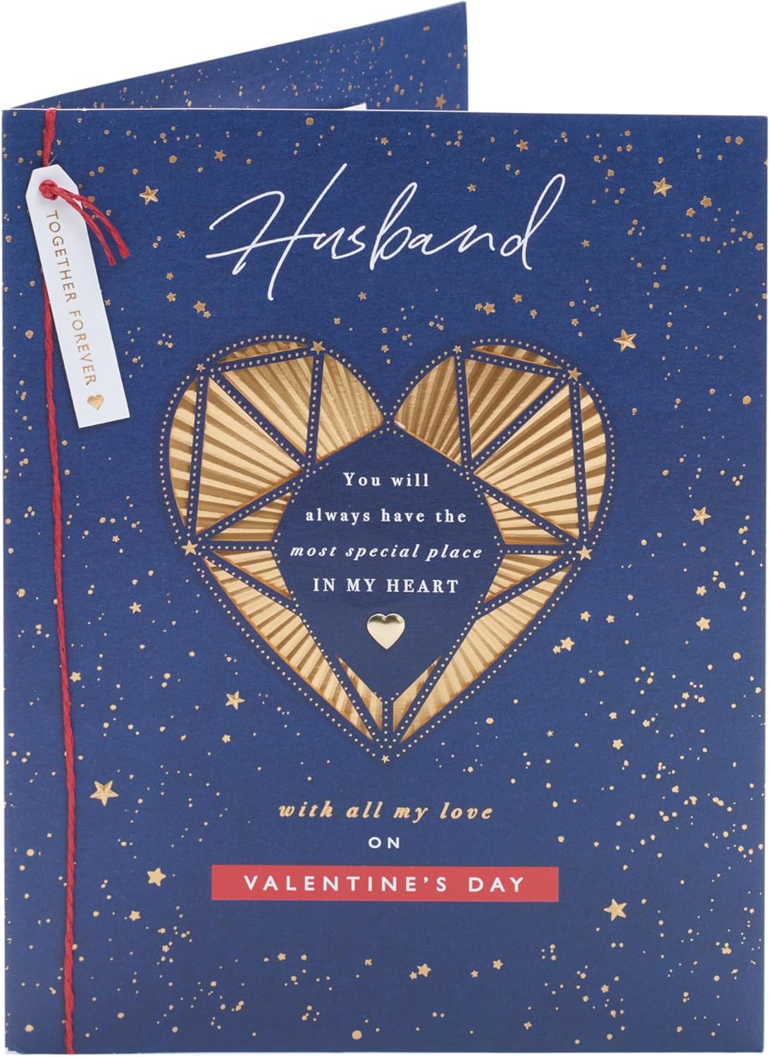 UK Greetings Valentine's Day card for husband featuring an intricate gold heart design on a greeting card.