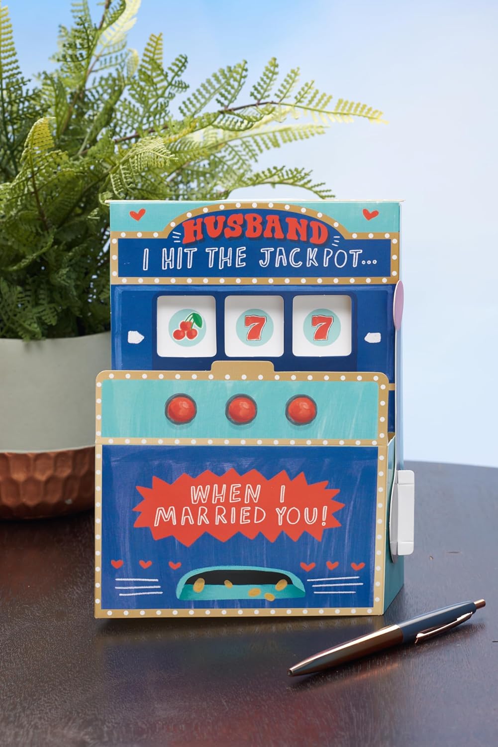 UK Greetings Valentine's Day card for husband featuring a pop-up jackpot slot machine design, perfect for celebrating love.