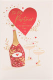 UK Greetings Valentine's Day greeting card for partner with champagne design, featuring romantic artwork and heartfelt message.