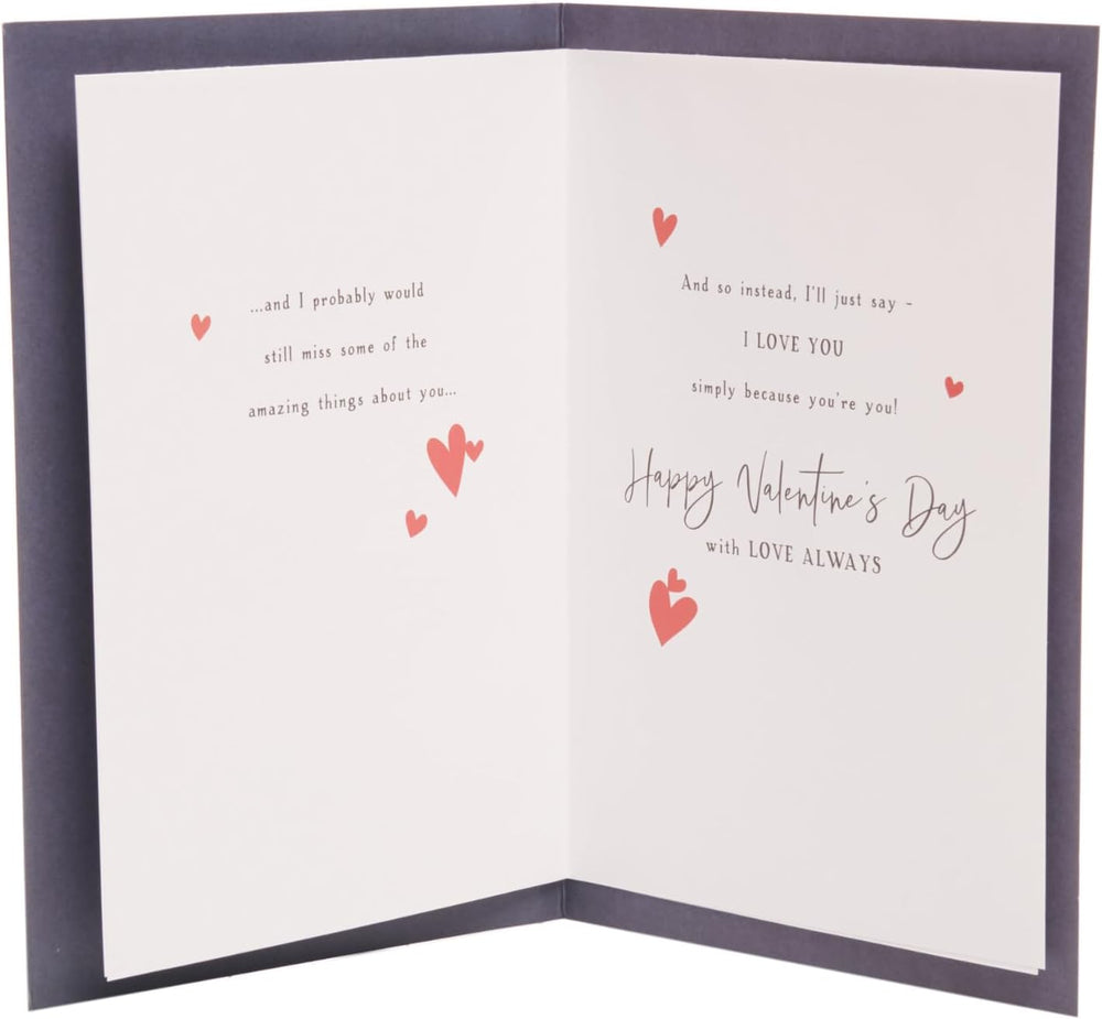 UK Greetings Valentine's Day card featuring a stunning red heart design, perfect for expressing love to someone special.