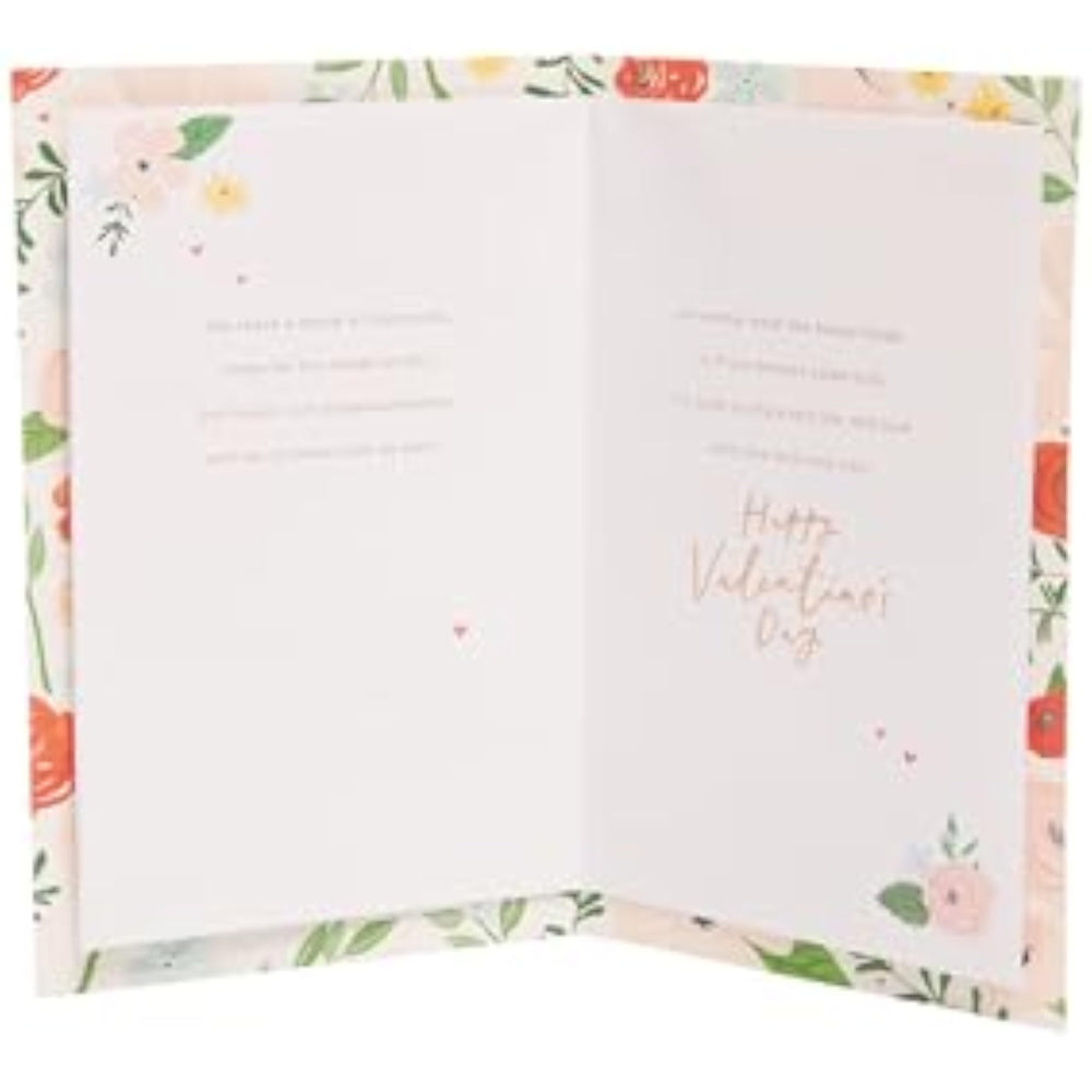 UK Greetings Valentine's Day card for wife with bright floral design, featuring colorful flowers and romantic message.