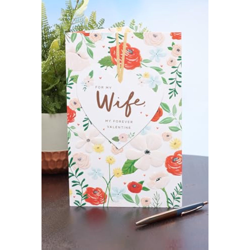 UK Greetings Valentine's Day card for wife featuring a bright floral design, perfect for expressing love on special occasions.