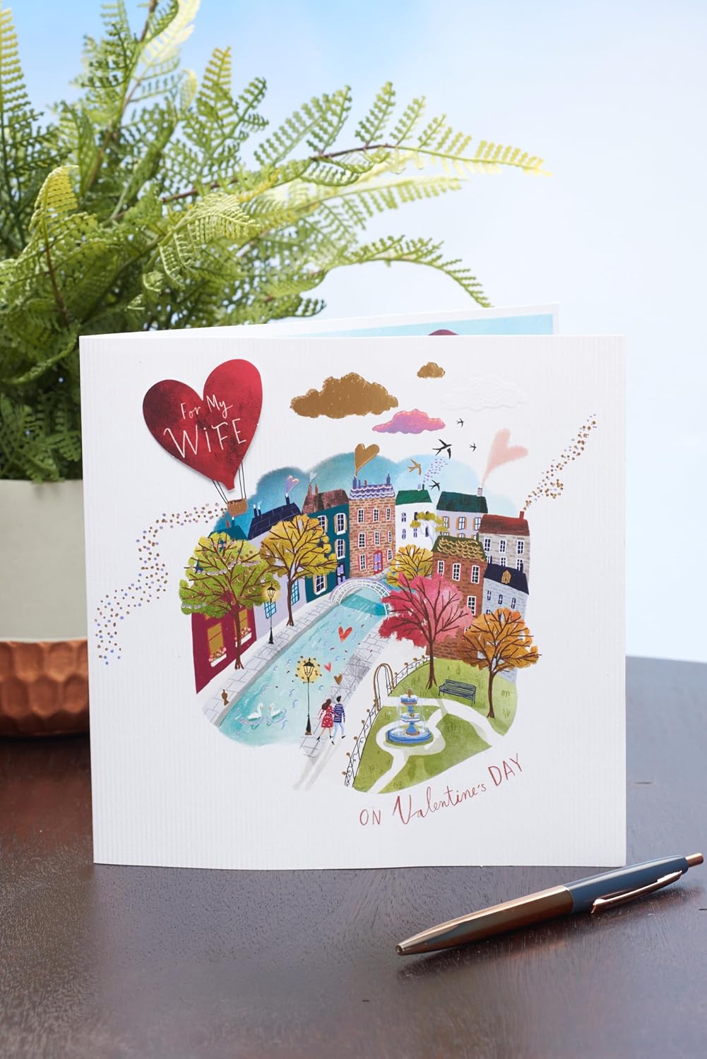 UK Greetings Valentine's Day card for wife featuring a cute couple scene design, perfect for expressing love on special occasions.