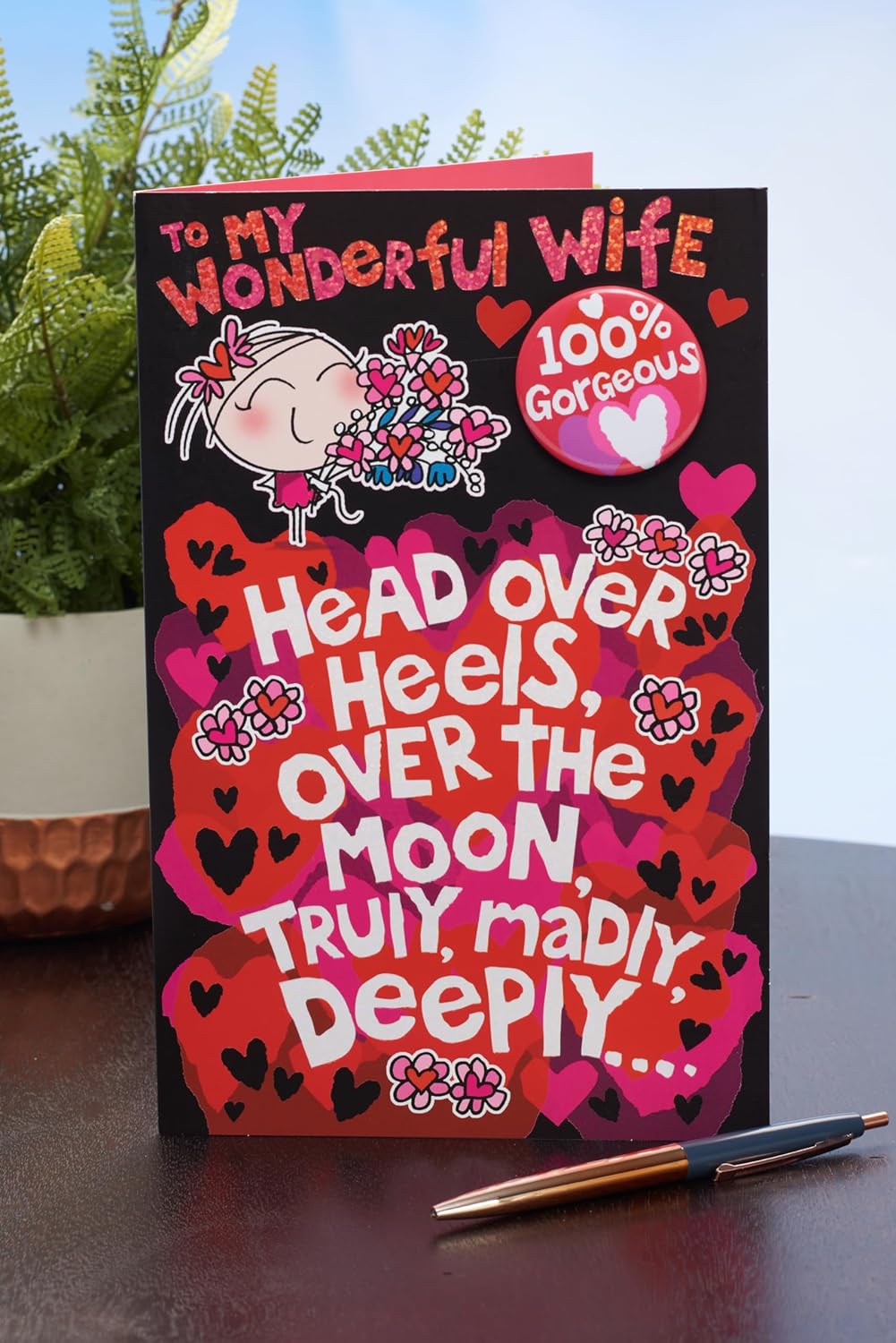 UK Greetings Valentine's Day card for wife featuring a cute design and a decorative badge, perfect for expressing love.