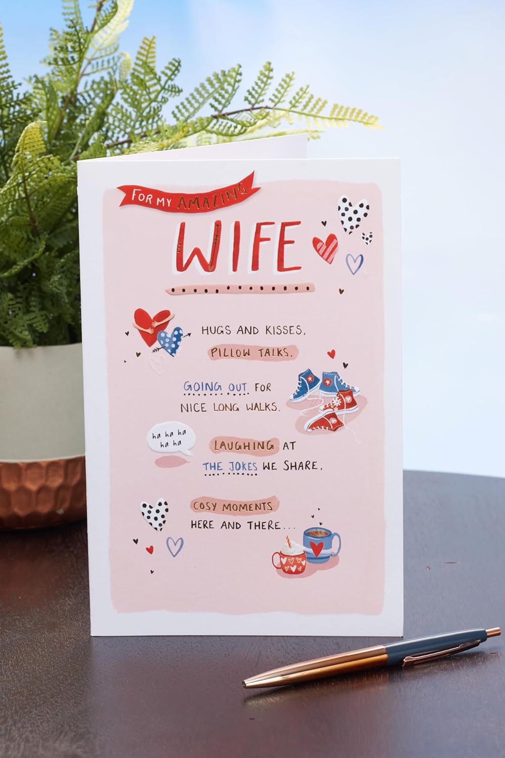 UK Greetings Valentine's Day card for wife featuring a cute light pink design, perfect for expressing love on special occasions.