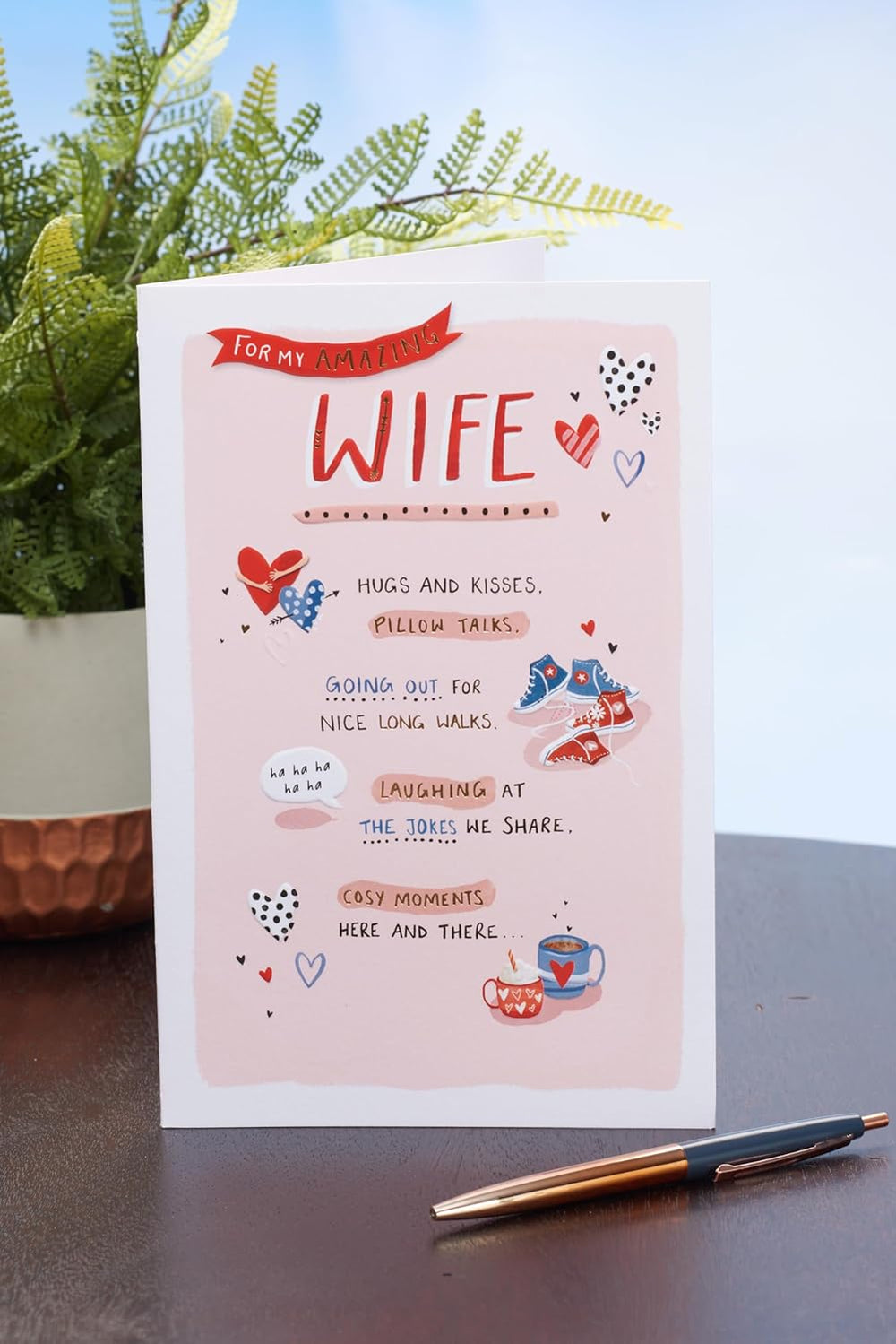 UK Greetings Valentine's Day card for wife featuring a cute light pink design, perfect for expressing love on special occasions.