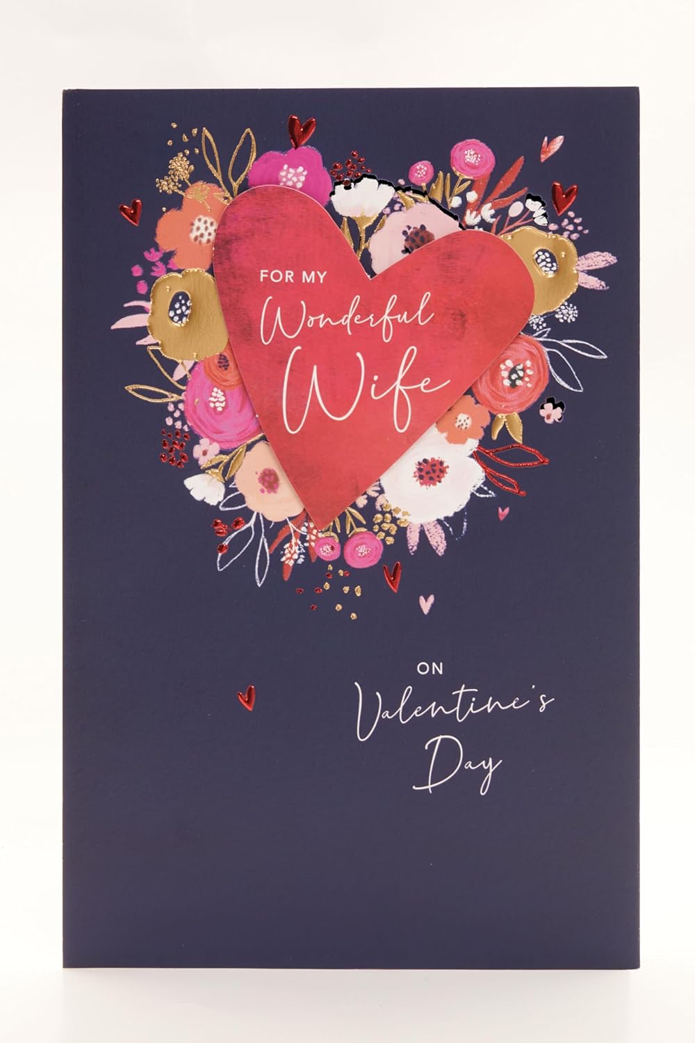 UK Greetings Valentine's Day card for wife featuring a floral heart design, perfect for expressing love on special occasions.