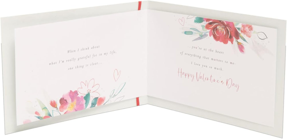 Pink floral Valentine’s Day greeting card for wife by UK Greetings featuring a romantic floral design.