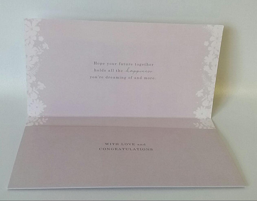 UK Greetings wedding gift money wallet and greeting card, featuring elegant design for wedding celebrations.