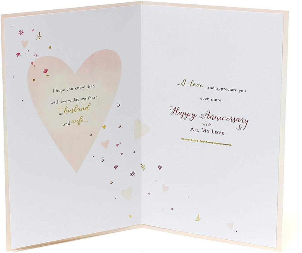 UK Greetings Wife Rose Wedding Anniversary Card with a beautiful floral design and heartfelt verse for special occasions.