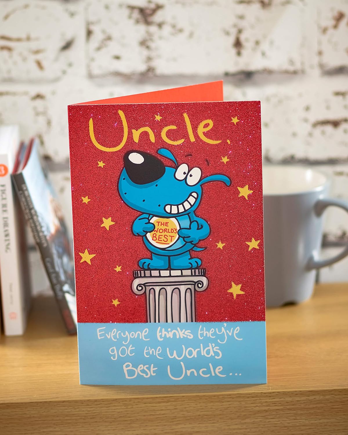 UK Greetings World's Best Uncle birthday card featuring colorful, festive design for celebrating special occasions.