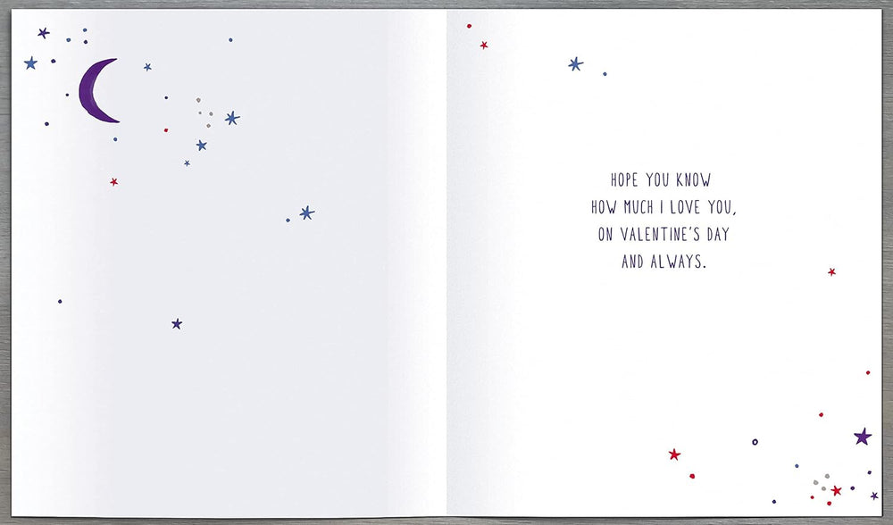 UK Greetings Valentine's Day card featuring sun, moon, and stars design, expressing love and affection in a colorful greeting card.