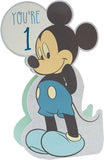UK Greetings Disney Mickey Mouse baby boy birthday card with die-cut design featuring Mickey Mouse and festive elements.