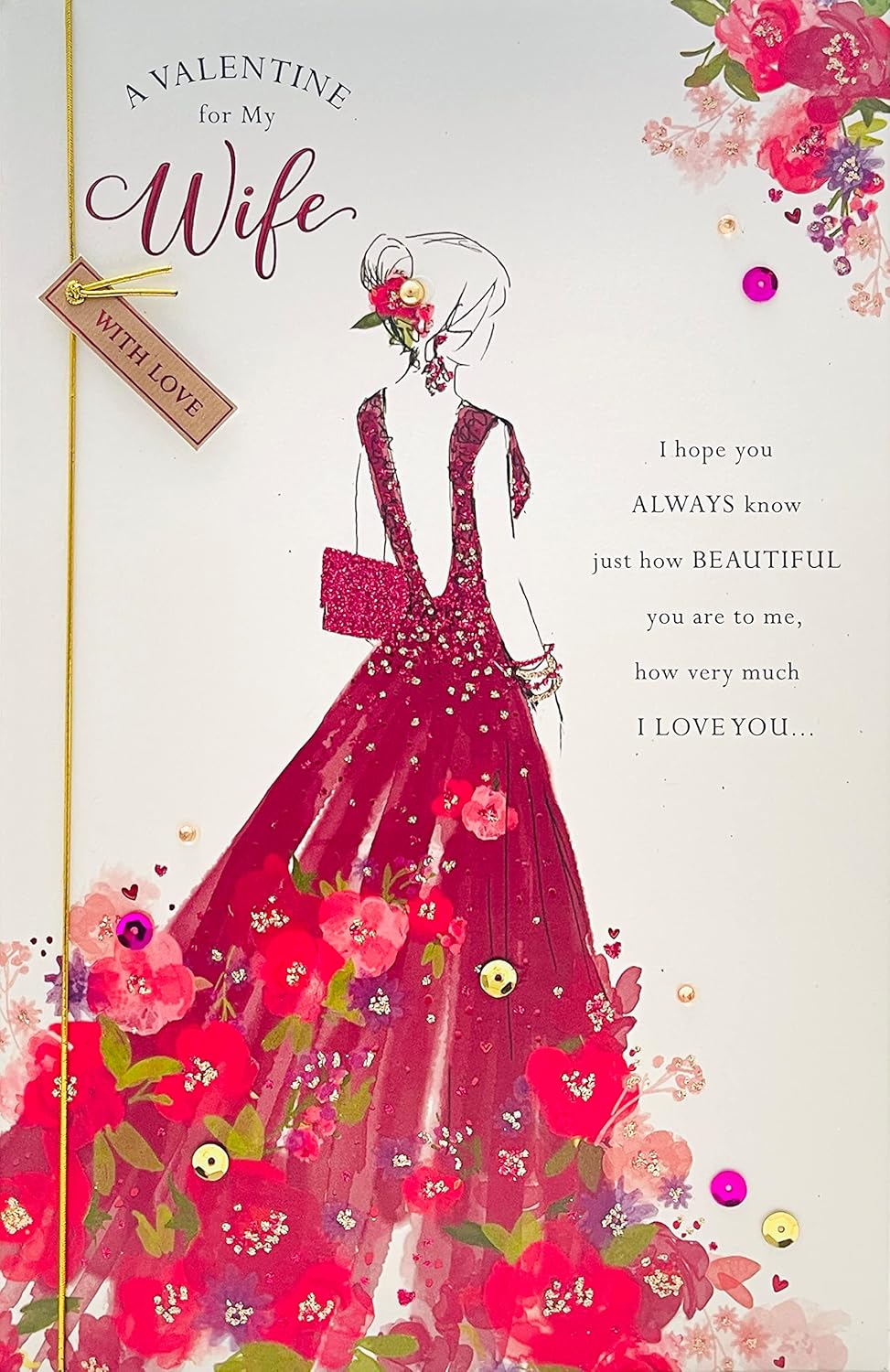 UK Greetings Valentine's Day greeting card featuring a woman in a red dress, roses, 3D embellishments, sequins, glitter, and heartfelt verse.