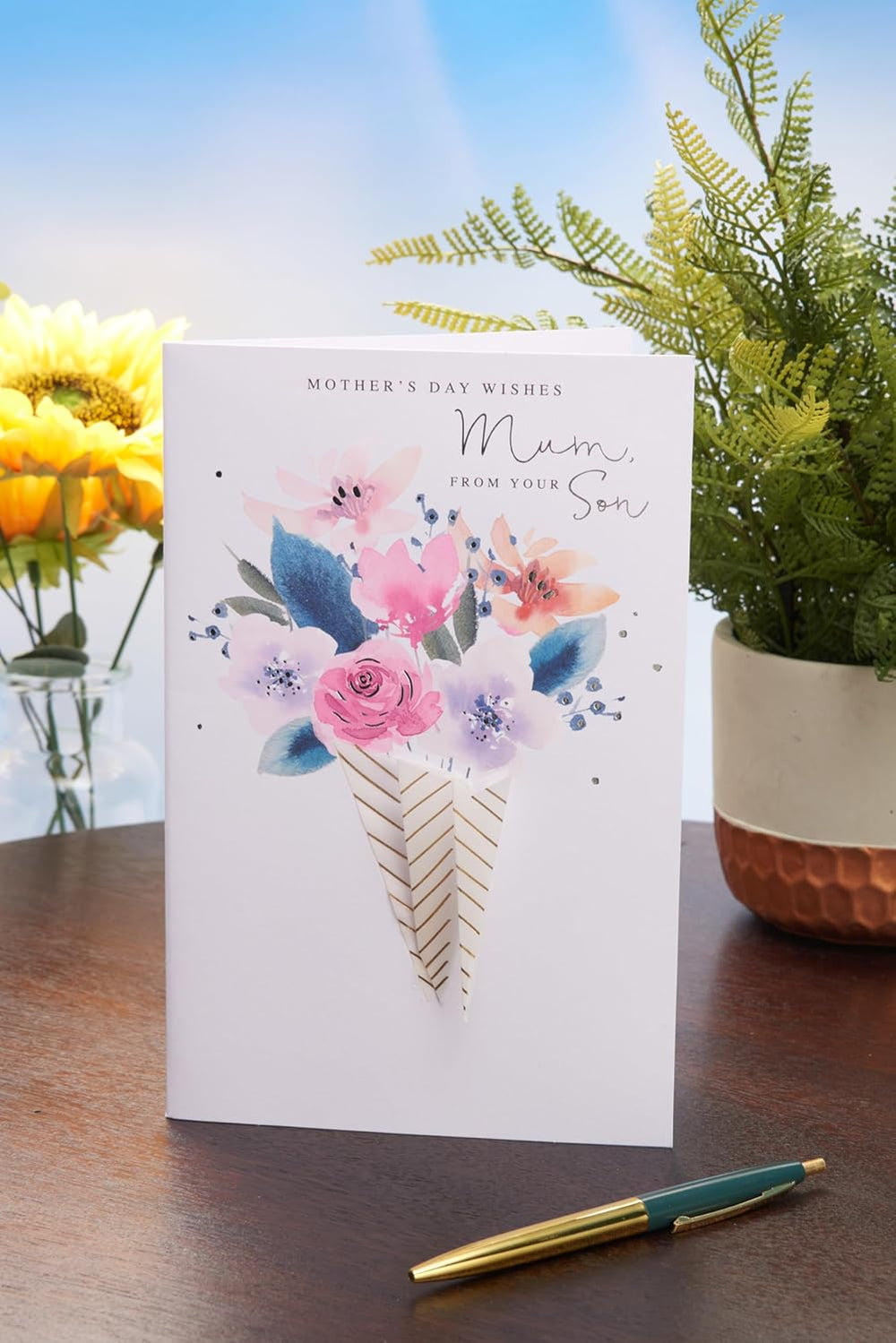 UK Greetings Mother's Day Card for Mum from Your Son featuring a floral bouquet design, with colorful flowers and heartfelt message.