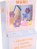 UK Greetings Mother's Day Card for Mum featuring an interactive teddy machine design with colorful illustrations.