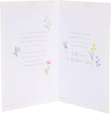 UK Greetings Mother's Day Card for Mum featuring the "What Is a Mum?" design, with floral and heartfelt illustrations.