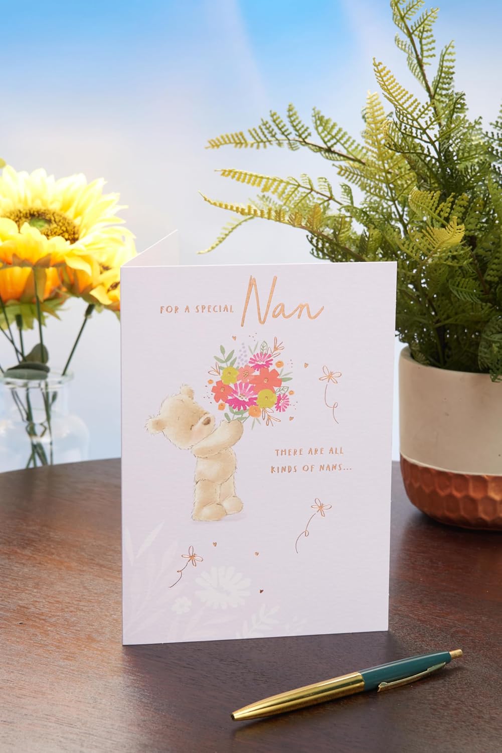 UK Greetings Mother's Day Card for Nan featuring a cute teddy bear design, perfect for celebrating moms on Mother's Day