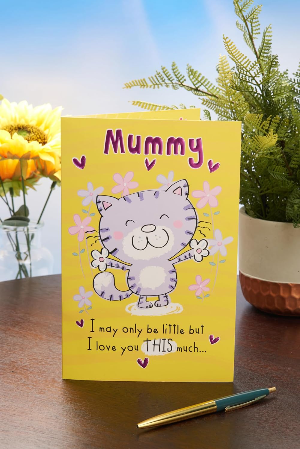 UK Greetings Mother's Day card for Mummy featuring a cute cartoon cat design, perfect for celebrating moms on Mother's Day.