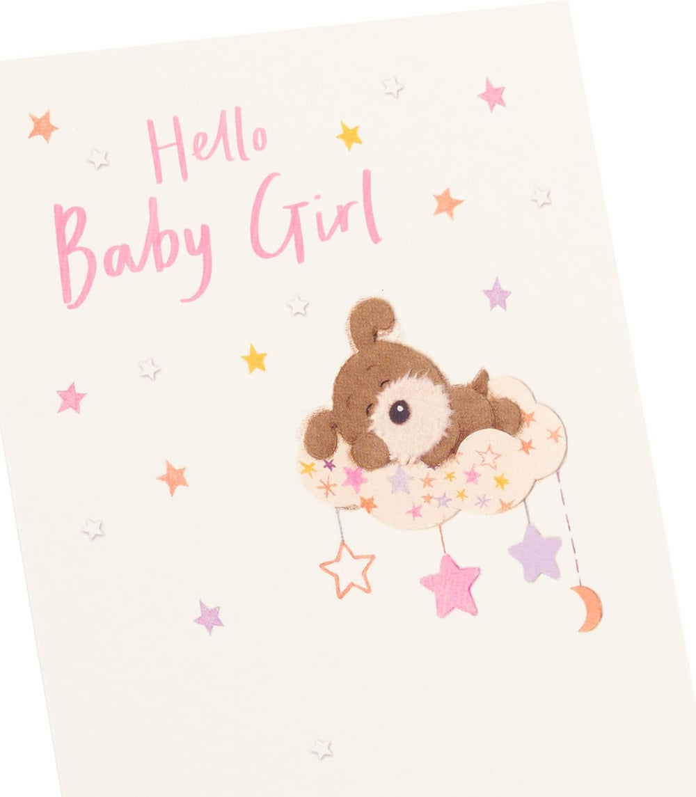 UK Greetings new baby girl congratulation card with a cute woof cloud design, perfect for celebrating a newborn.