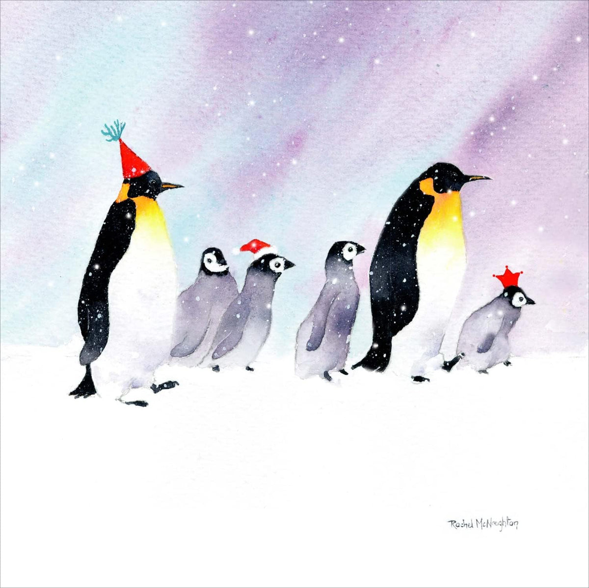 UK Greetings Christmas Penguins on a Mission Christmas card featuring festive penguins on decorated stationery for the holiday season
