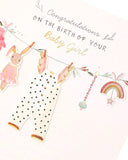 UK Greetings Congratulations It's a Girl New Baby Cards stationery with colorful designs and celebratory messages for new arrivals.