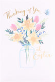 UK Greetings Easter card featuring daffodils in a vase with a "Thinking of You" message, part of stationery collection.