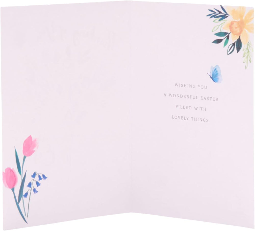 UK Greetings Easter card featuring daffodils in a vase with a "Thinking of You" message, part of stationery collection.