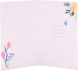 UK Greetings Easter card featuring daffodils in a vase with a "Thinking of You" message, part of stationery collection.